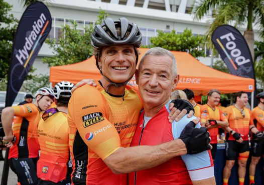 Igor Makarov with fellow cyclists at a charity event