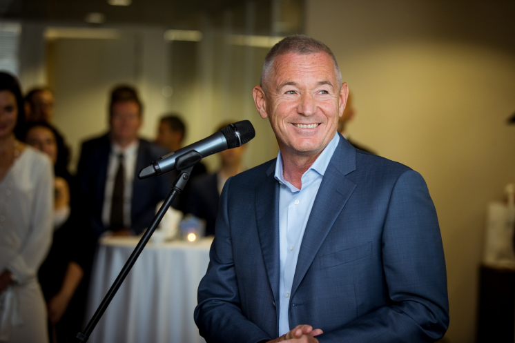 Igor Makarov delivering a speech at a business event